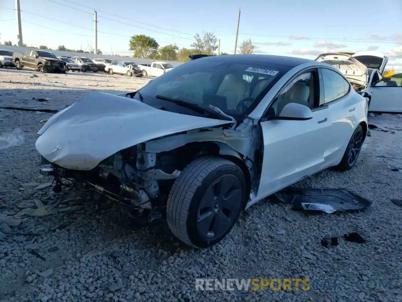 2 Photograph of a damaged car 5YJ3E1EB2NF103444 TESLA MODEL 3 2022