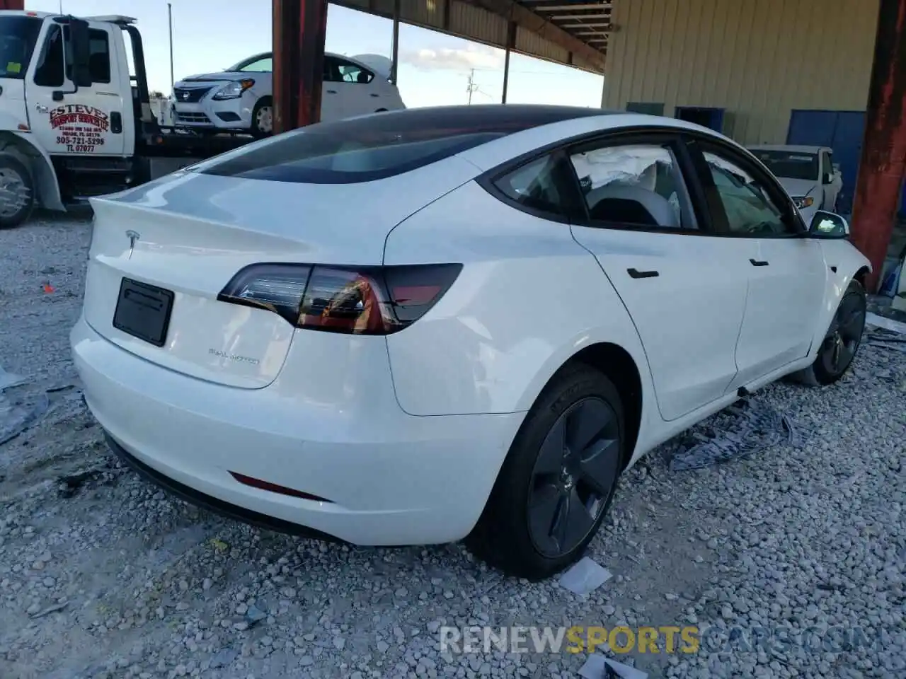 4 Photograph of a damaged car 5YJ3E1EB2NF103444 TESLA MODEL 3 2022