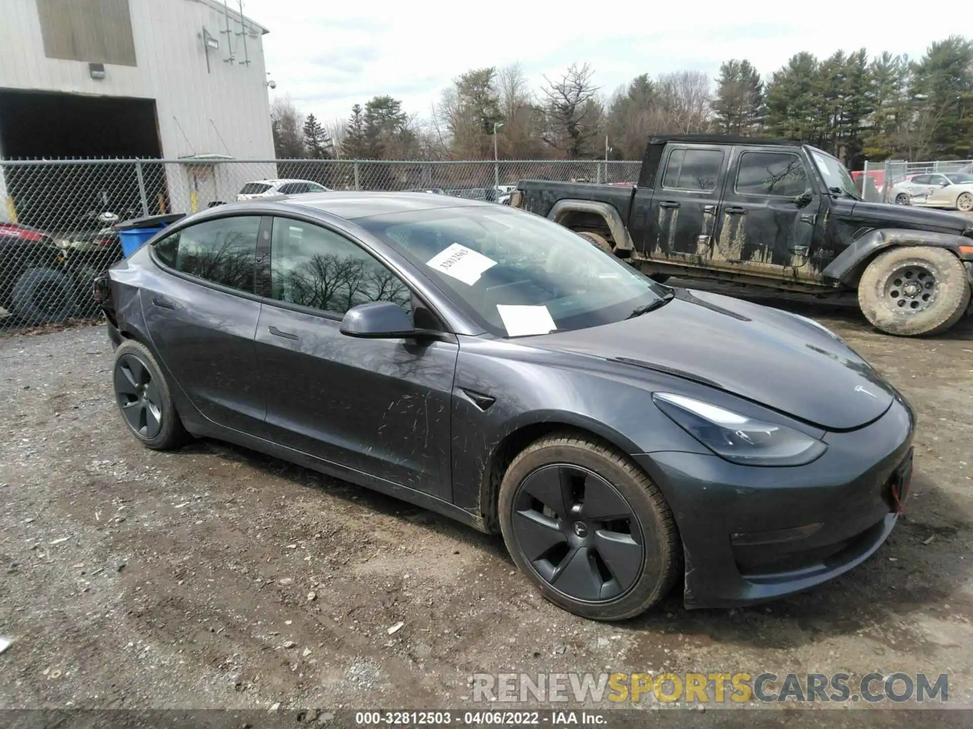 1 Photograph of a damaged car 5YJ3E1EB2NF119823 TESLA MODEL 3 2022