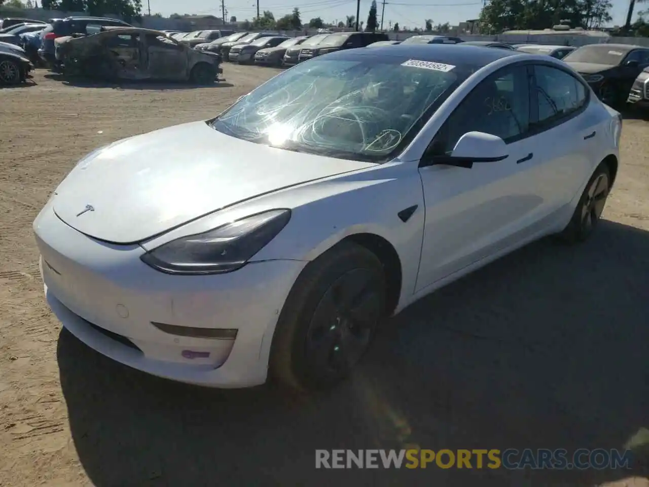 2 Photograph of a damaged car 5YJ3E1EB2NF121703 TESLA MODEL 3 2022