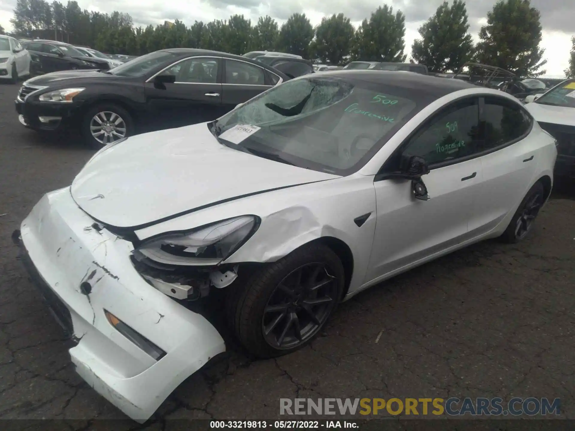 2 Photograph of a damaged car 5YJ3E1EB2NF123340 TESLA MODEL 3 2022