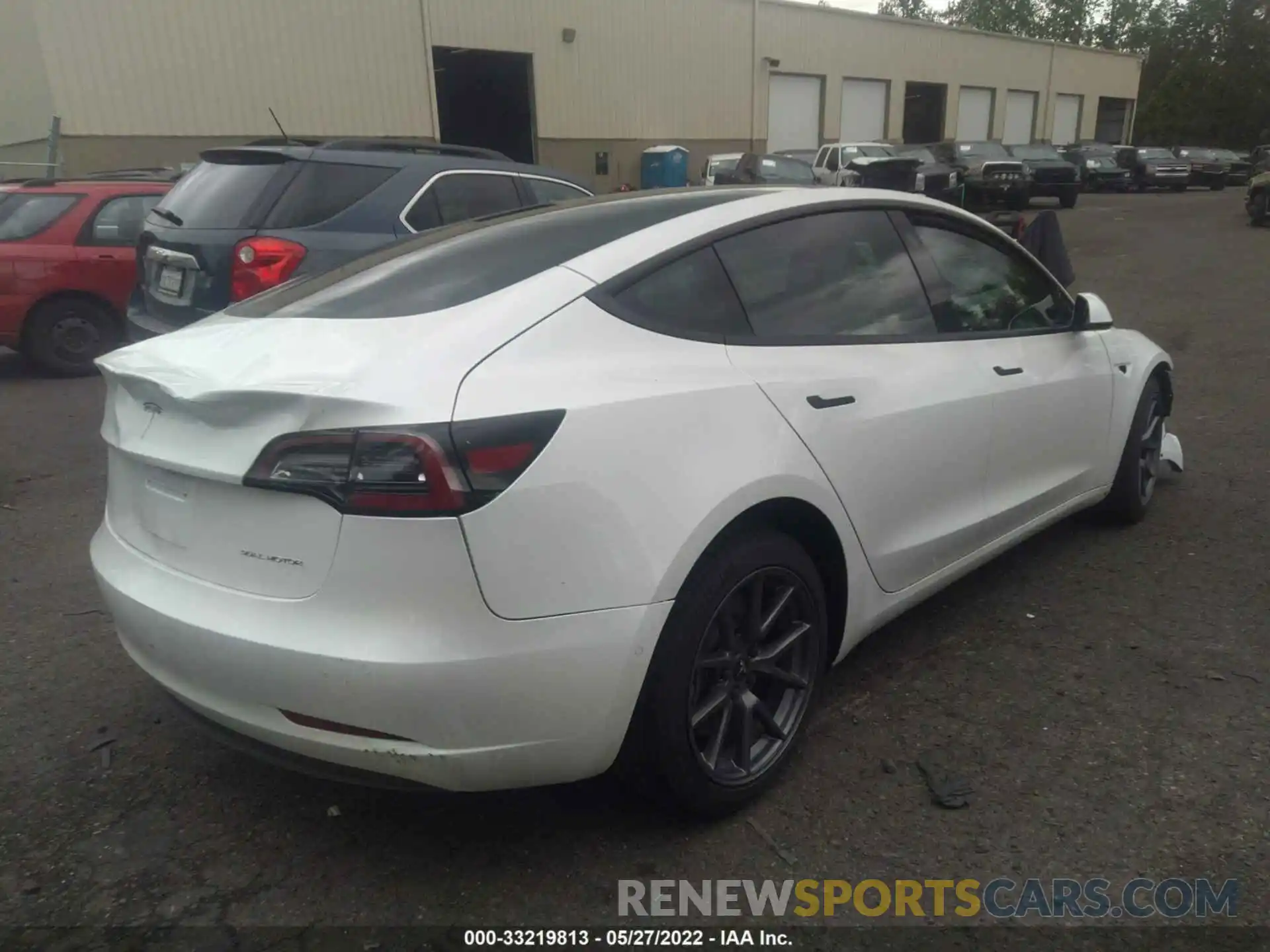 4 Photograph of a damaged car 5YJ3E1EB2NF123340 TESLA MODEL 3 2022