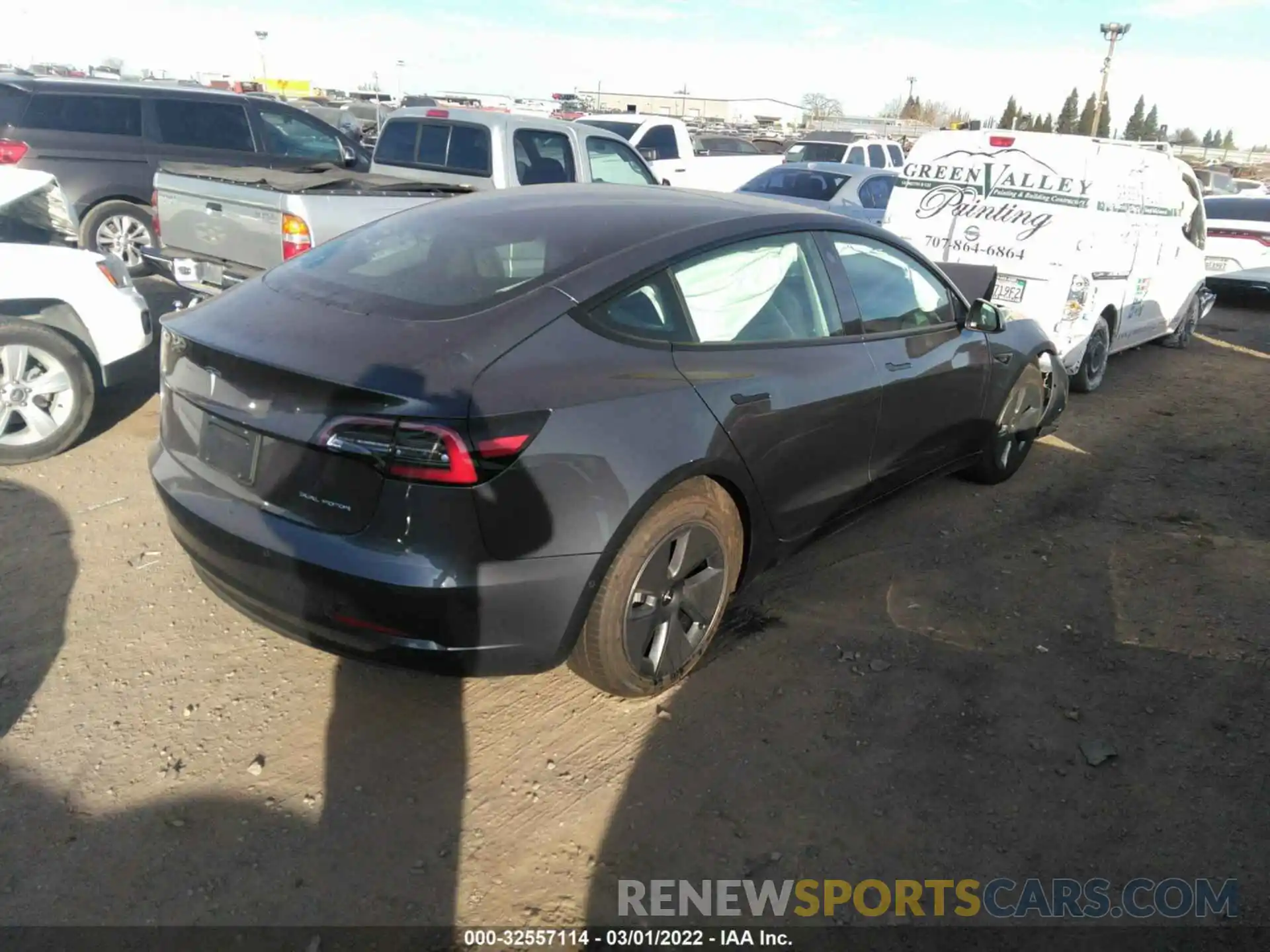 4 Photograph of a damaged car 5YJ3E1EB2NF130725 TESLA MODEL 3 2022