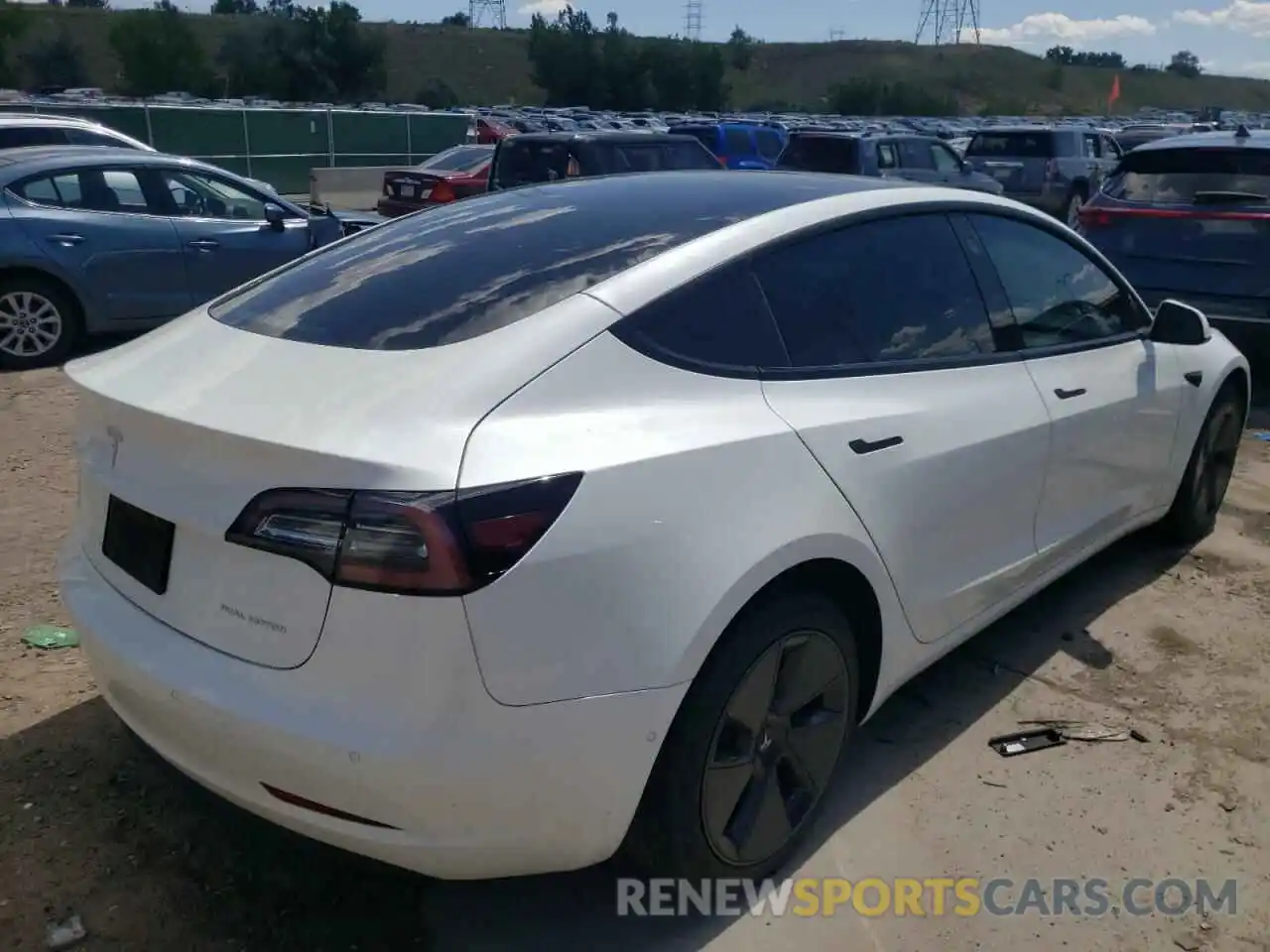 4 Photograph of a damaged car 5YJ3E1EB2NF131454 TESLA MODEL 3 2022