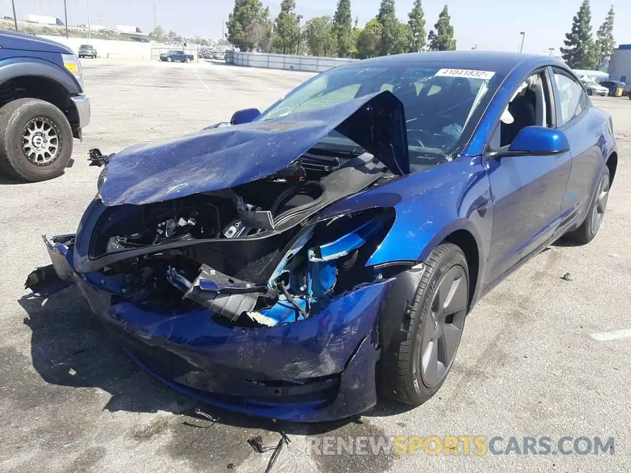 2 Photograph of a damaged car 5YJ3E1EB2NF132555 TESLA MODEL 3 2022