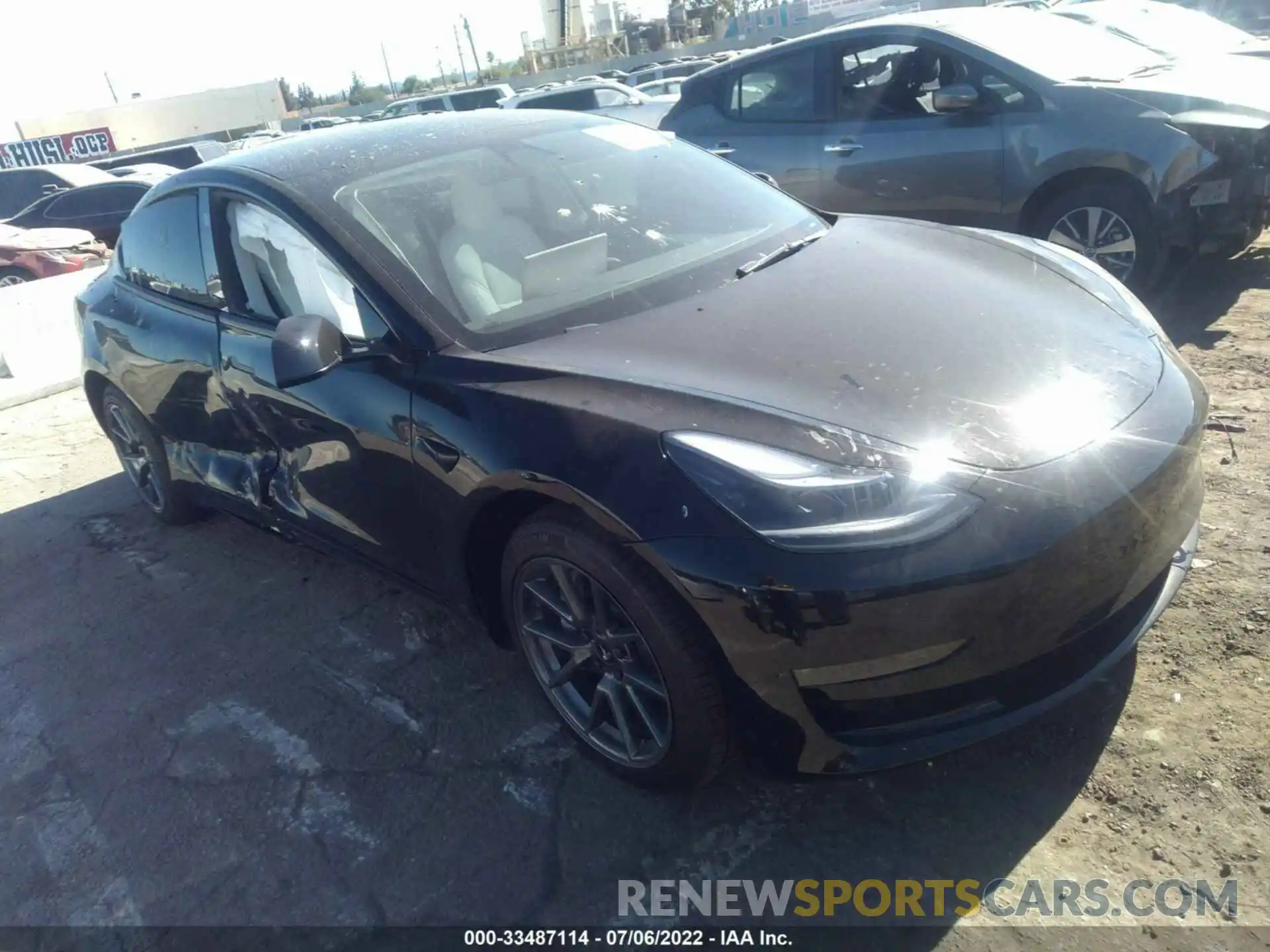 1 Photograph of a damaged car 5YJ3E1EB2NF137643 TESLA MODEL 3 2022