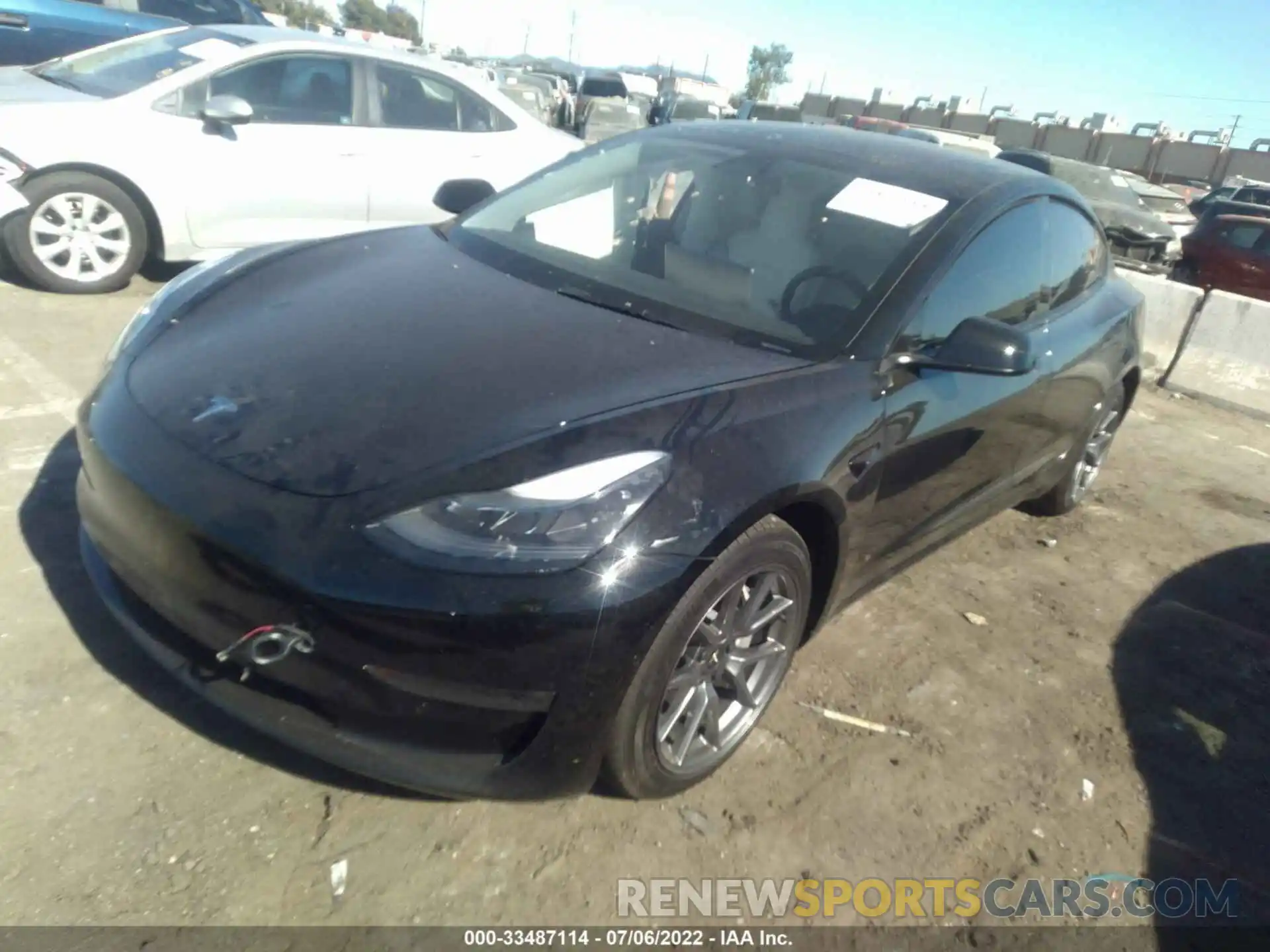 2 Photograph of a damaged car 5YJ3E1EB2NF137643 TESLA MODEL 3 2022