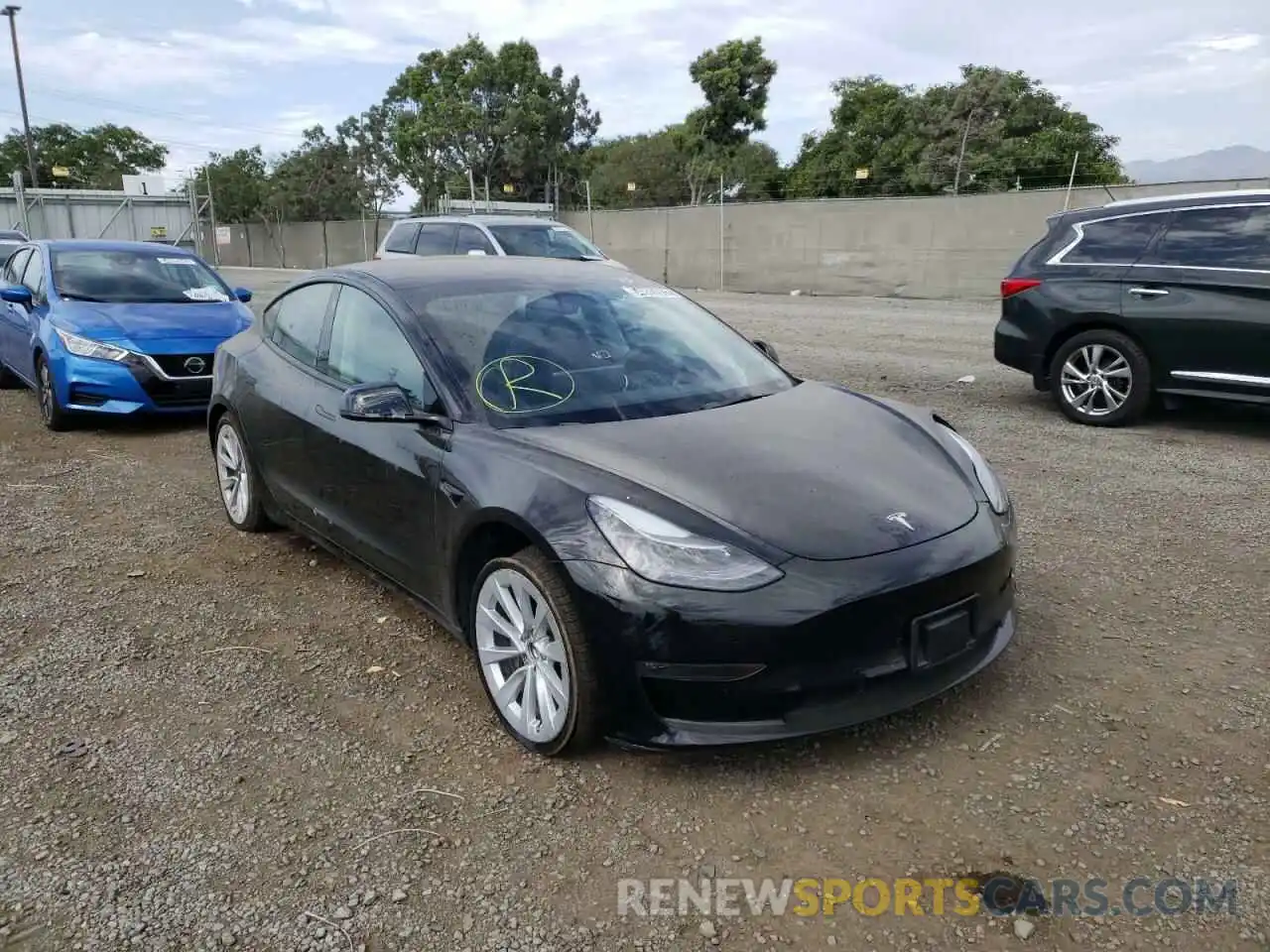 1 Photograph of a damaged car 5YJ3E1EB2NF143555 TESLA MODEL 3 2022