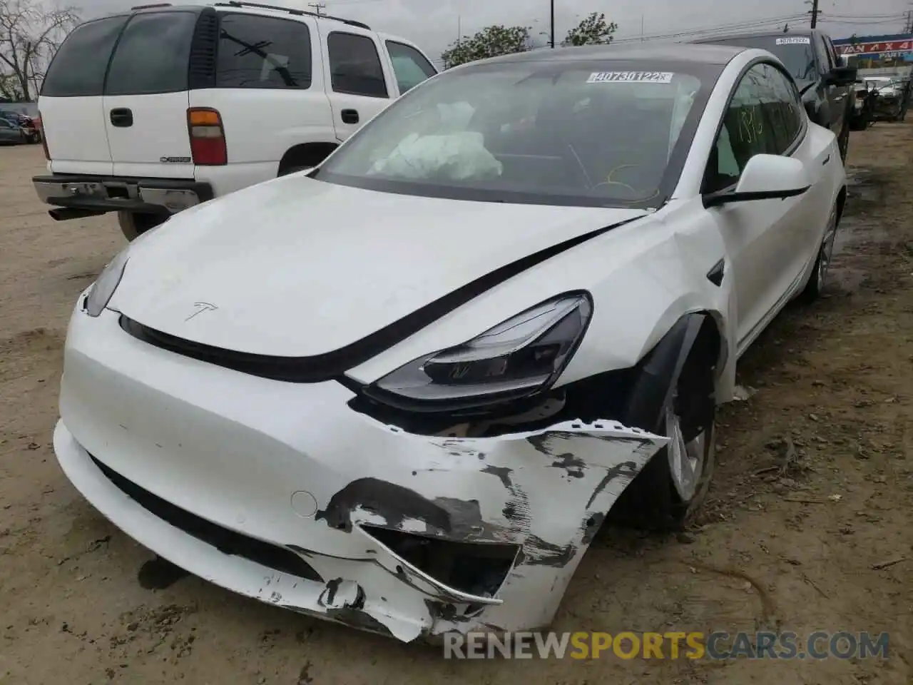 2 Photograph of a damaged car 5YJ3E1EB2NF143569 TESLA MODEL 3 2022