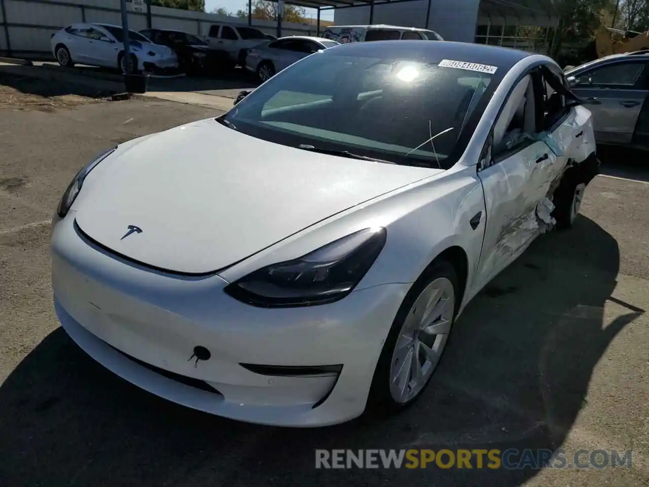 2 Photograph of a damaged car 5YJ3E1EB2NF144429 TESLA MODEL 3 2022