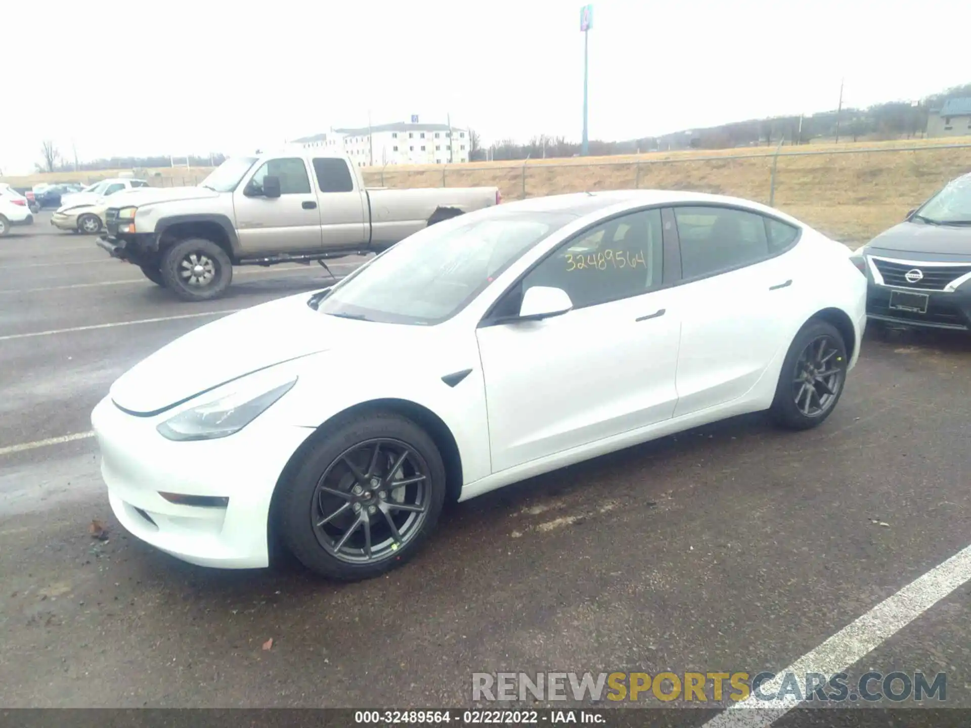 2 Photograph of a damaged car 5YJ3E1EB2NF162154 TESLA MODEL 3 2022