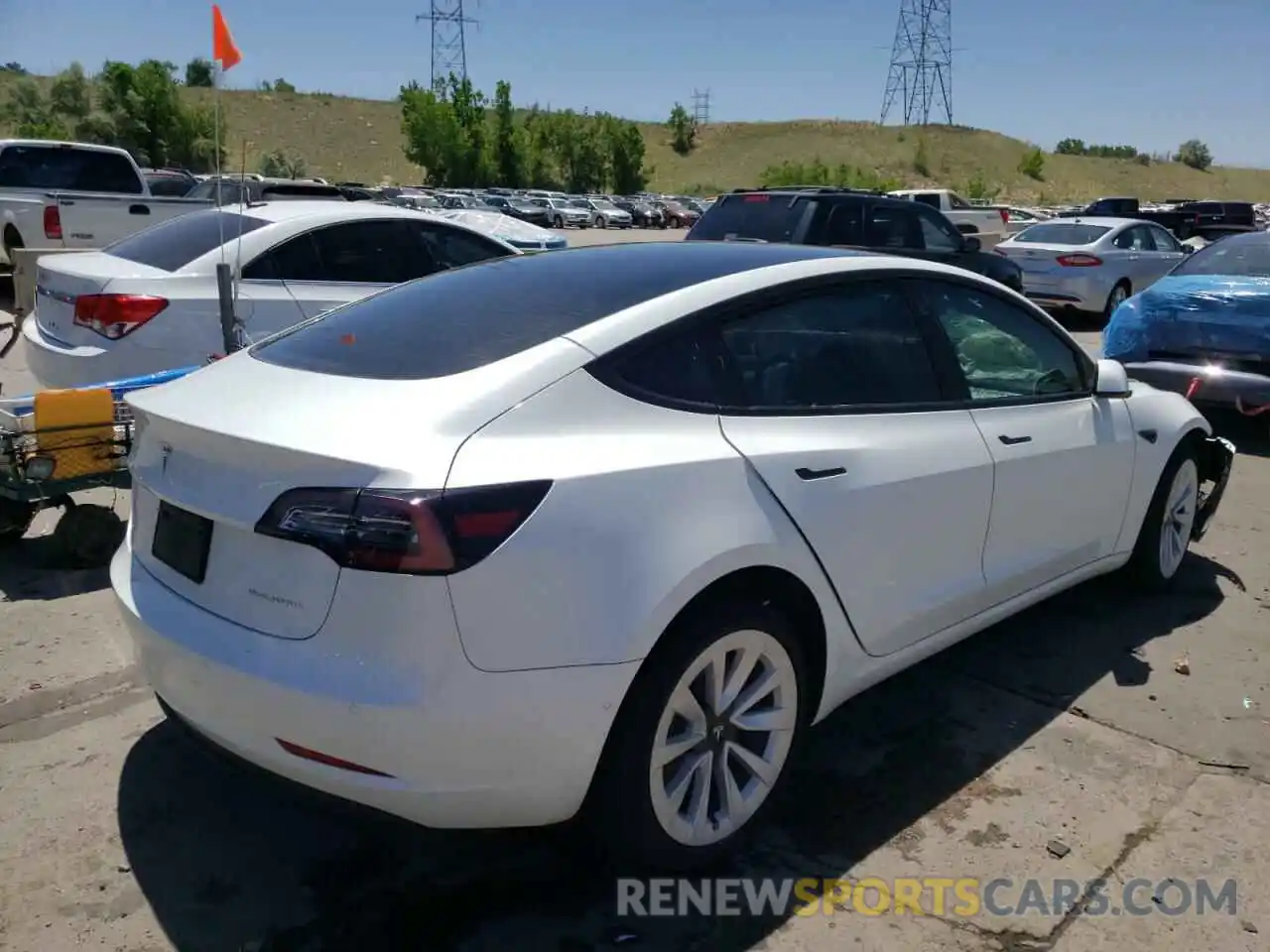 4 Фотография поврежденного автомобиля 5YJ3E1EB2NF180895 TESLA MODEL 3 2022