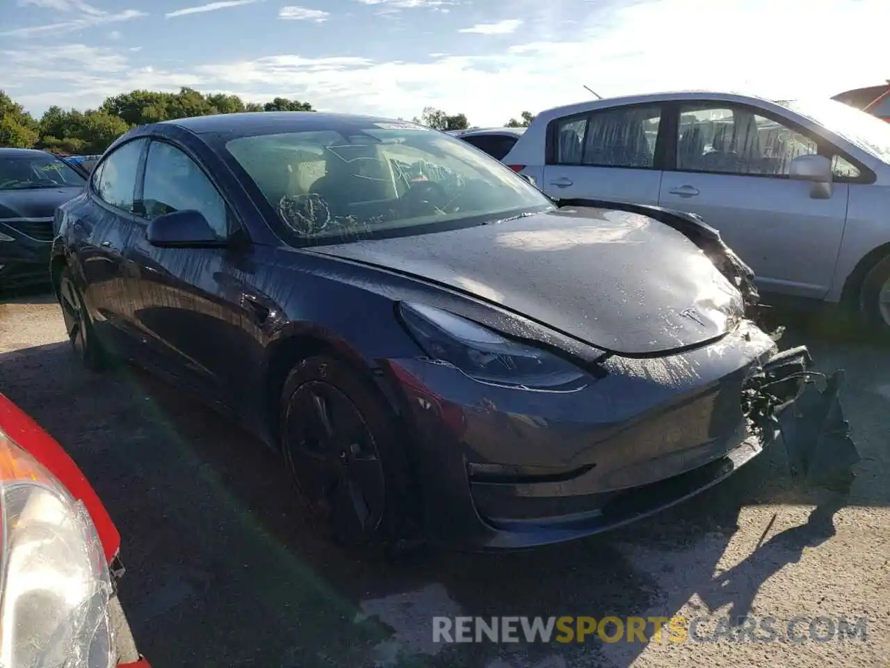 1 Photograph of a damaged car 5YJ3E1EB2NF183599 TESLA MODEL 3 2022