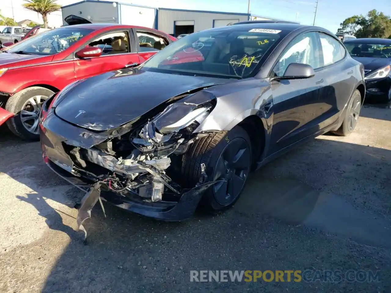 2 Photograph of a damaged car 5YJ3E1EB2NF183599 TESLA MODEL 3 2022