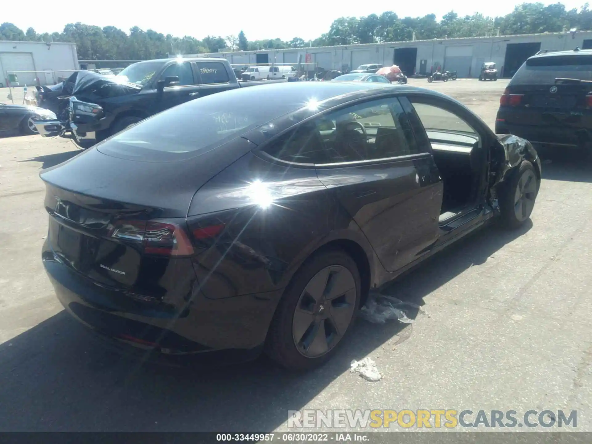 4 Photograph of a damaged car 5YJ3E1EB2NF185028 TESLA MODEL 3 2022