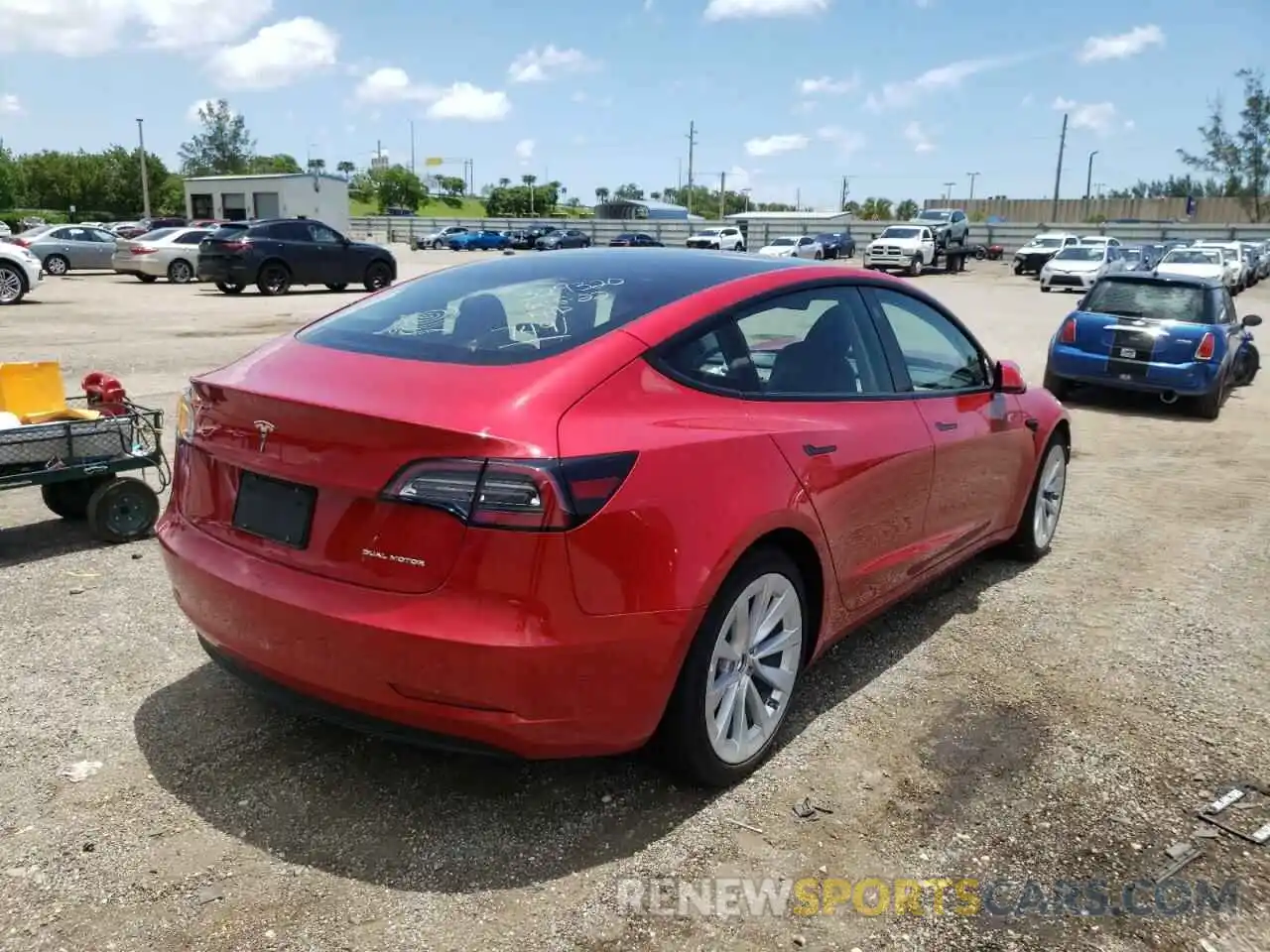 4 Photograph of a damaged car 5YJ3E1EB2NF187491 TESLA MODEL 3 2022