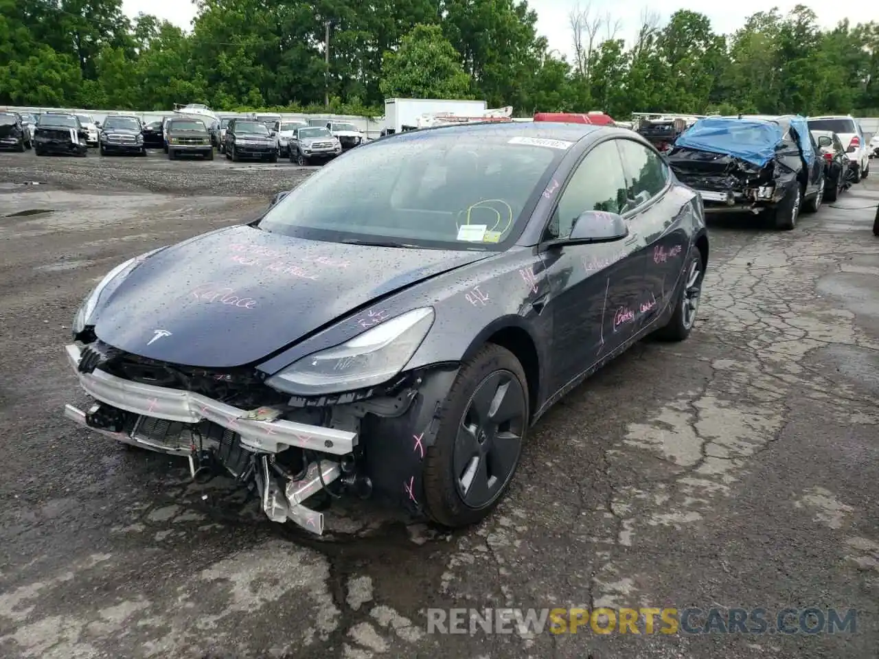 2 Photograph of a damaged car 5YJ3E1EB2NF195185 TESLA MODEL 3 2022