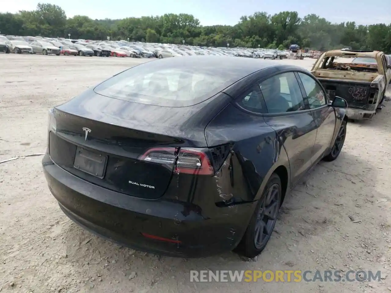 4 Photograph of a damaged car 5YJ3E1EB2NF205620 TESLA MODEL 3 2022