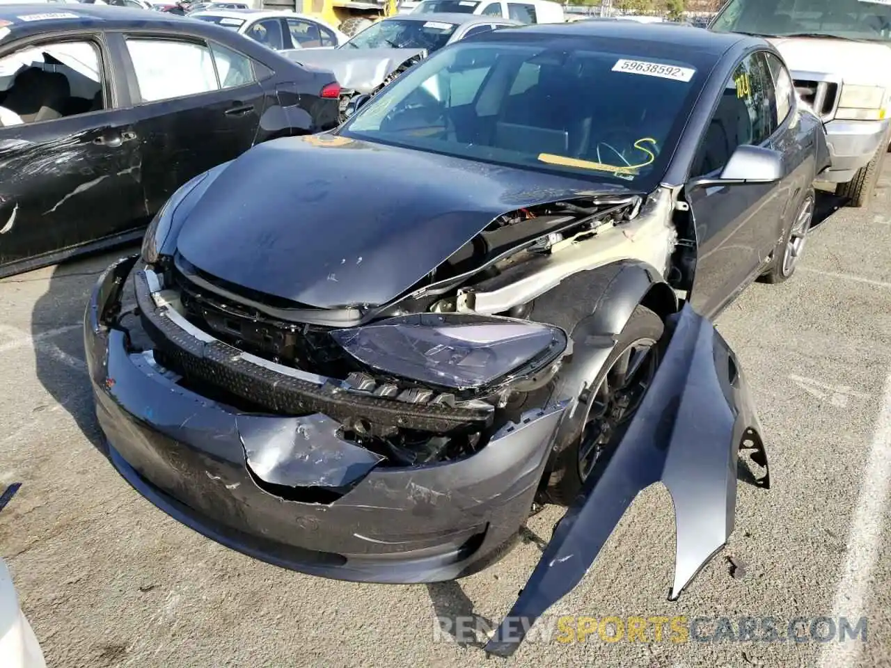 2 Photograph of a damaged car 5YJ3E1EB2NF208100 TESLA MODEL 3 2022