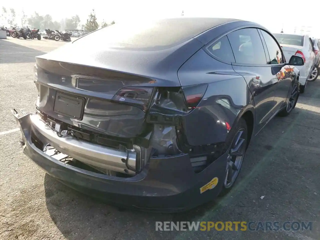 4 Photograph of a damaged car 5YJ3E1EB2NF208100 TESLA MODEL 3 2022