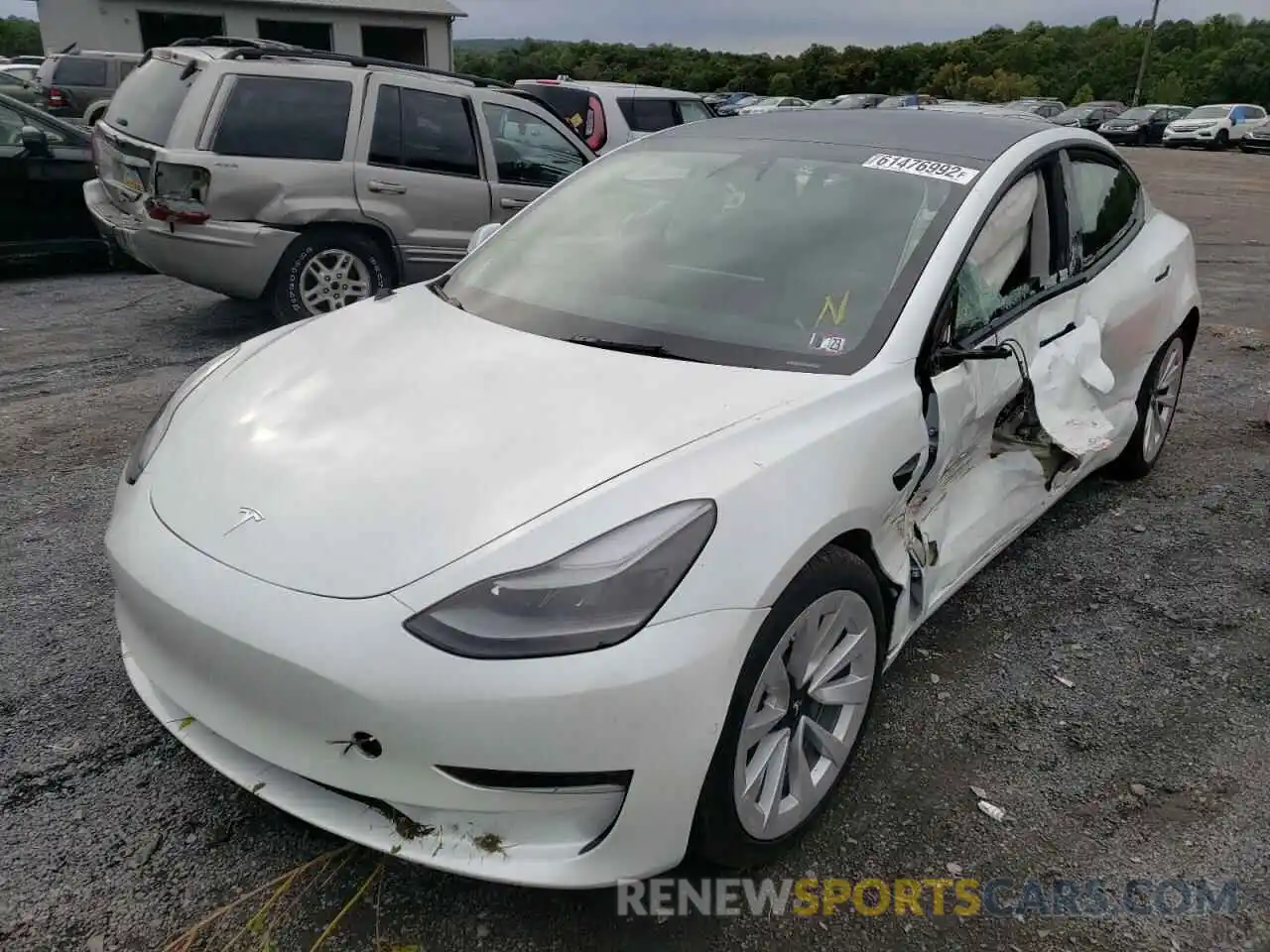 2 Photograph of a damaged car 5YJ3E1EB2NF229688 TESLA MODEL 3 2022