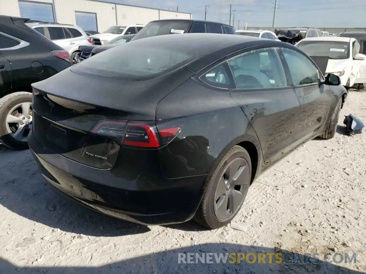 4 Photograph of a damaged car 5YJ3E1EB3NF117658 TESLA MODEL 3 2022