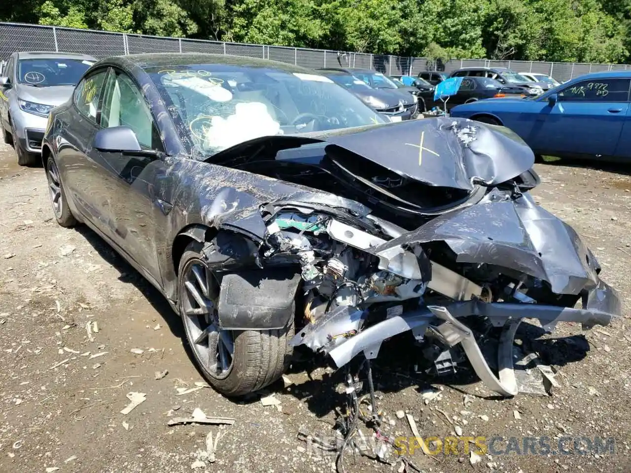 1 Photograph of a damaged car 5YJ3E1EB3NF174846 TESLA MODEL 3 2022