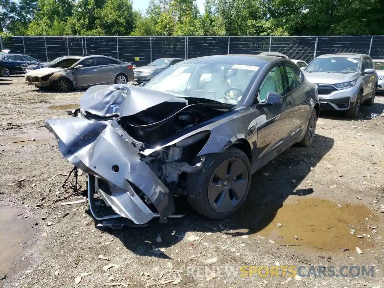 2 Photograph of a damaged car 5YJ3E1EB3NF174846 TESLA MODEL 3 2022