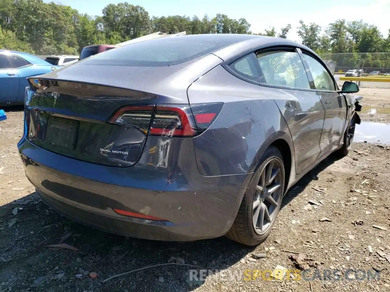 4 Photograph of a damaged car 5YJ3E1EB3NF174846 TESLA MODEL 3 2022