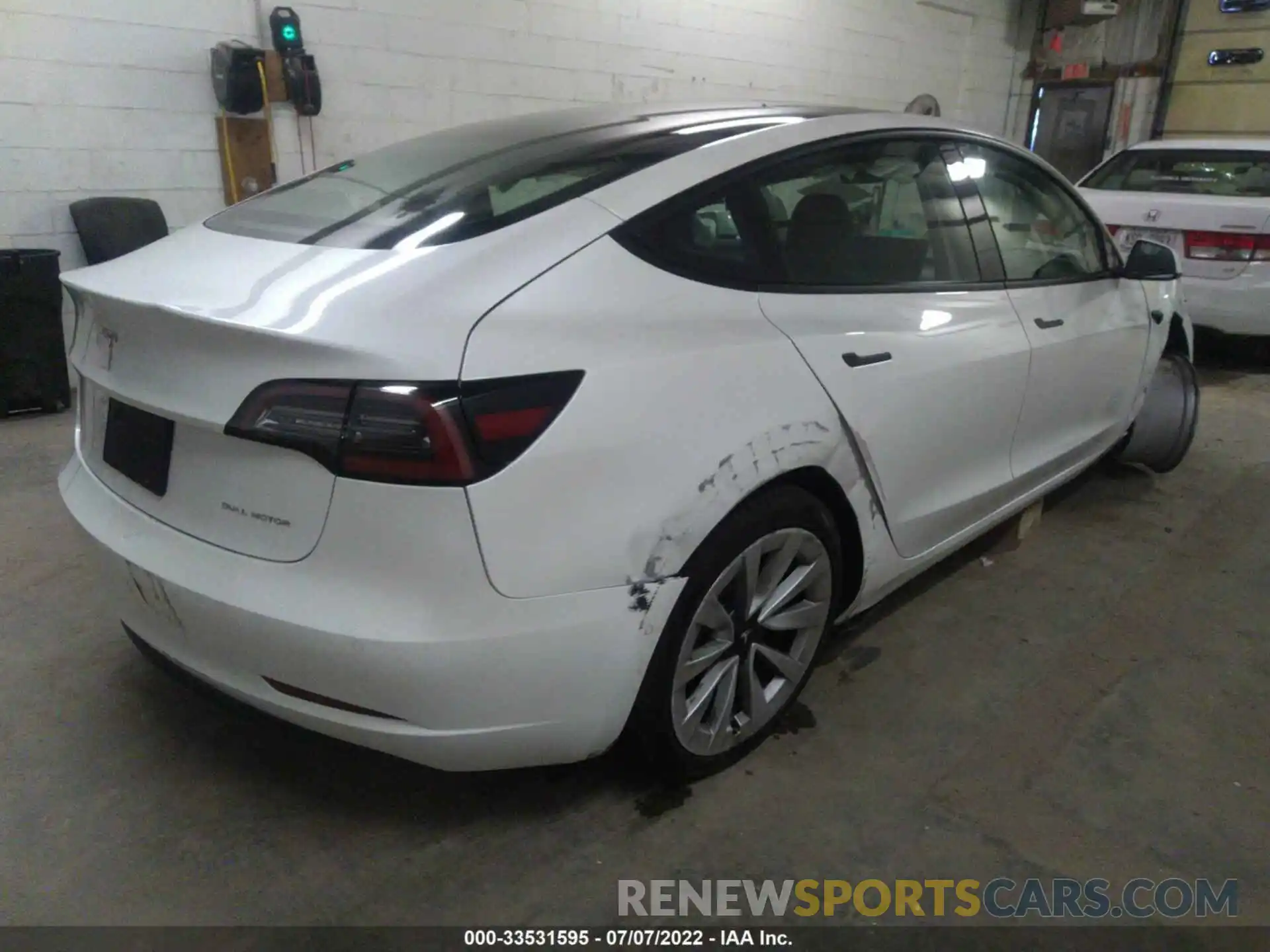 4 Photograph of a damaged car 5YJ3E1EB3NF174863 TESLA MODEL 3 2022