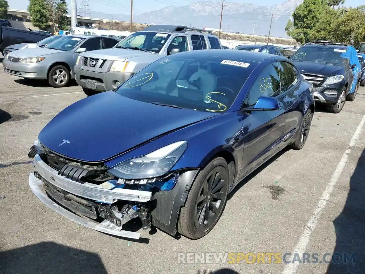 2 Photograph of a damaged car 5YJ3E1EB3NF192862 TESLA MODEL 3 2022