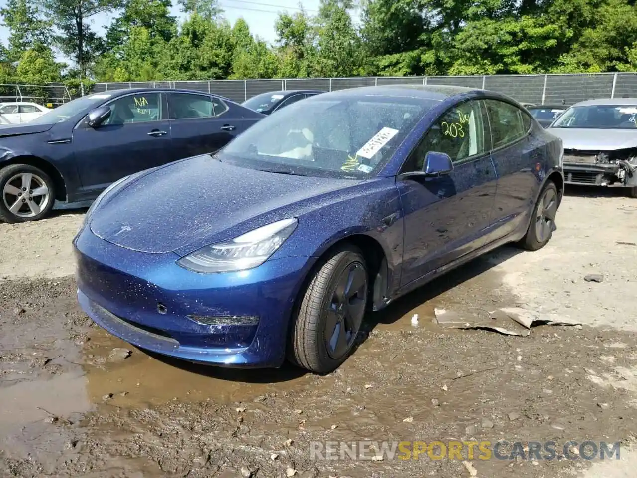 2 Photograph of a damaged car 5YJ3E1EB3NF240070 TESLA MODEL 3 2022