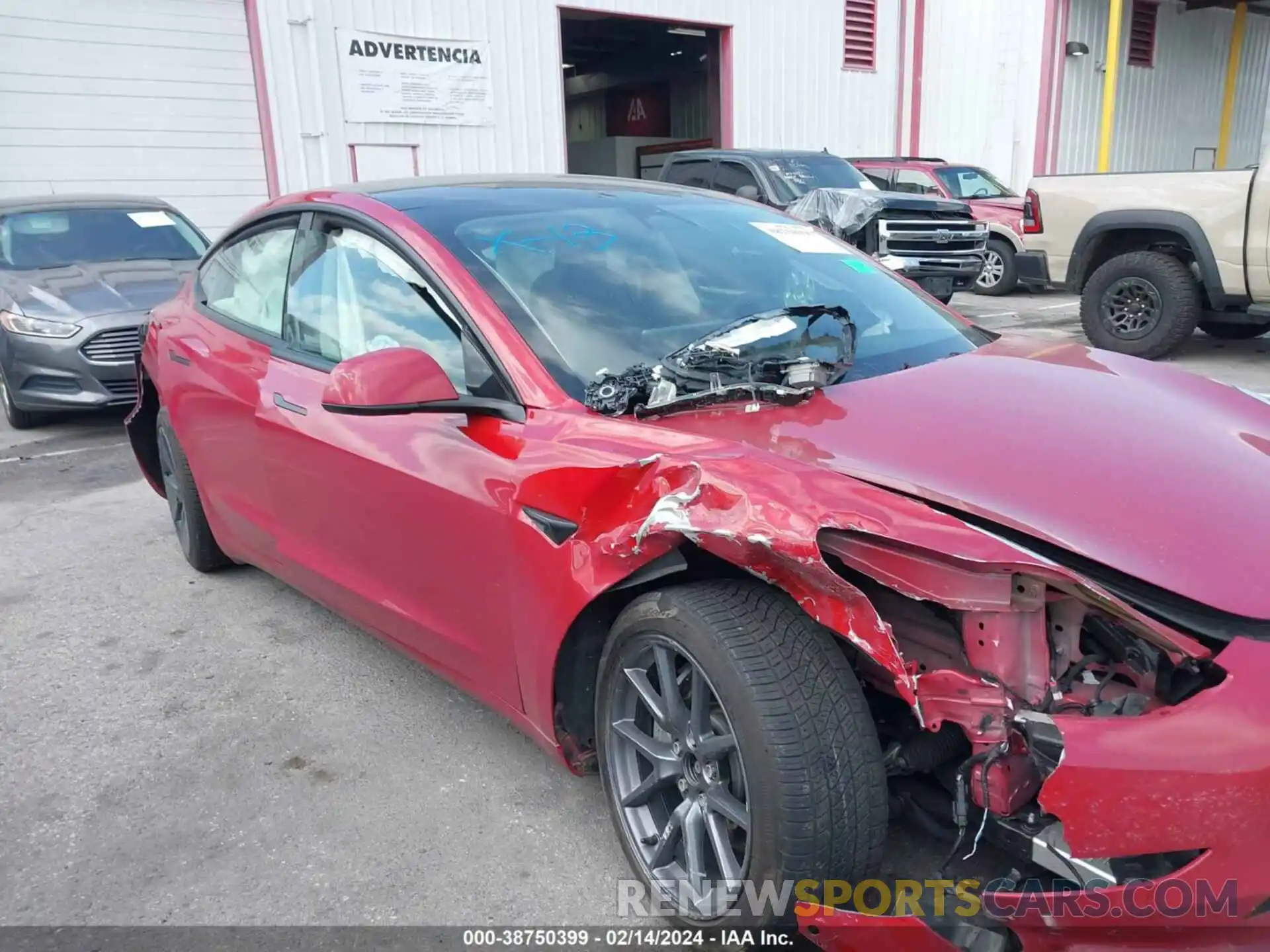 12 Photograph of a damaged car 5YJ3E1EB3NF317973 TESLA MODEL 3 2022