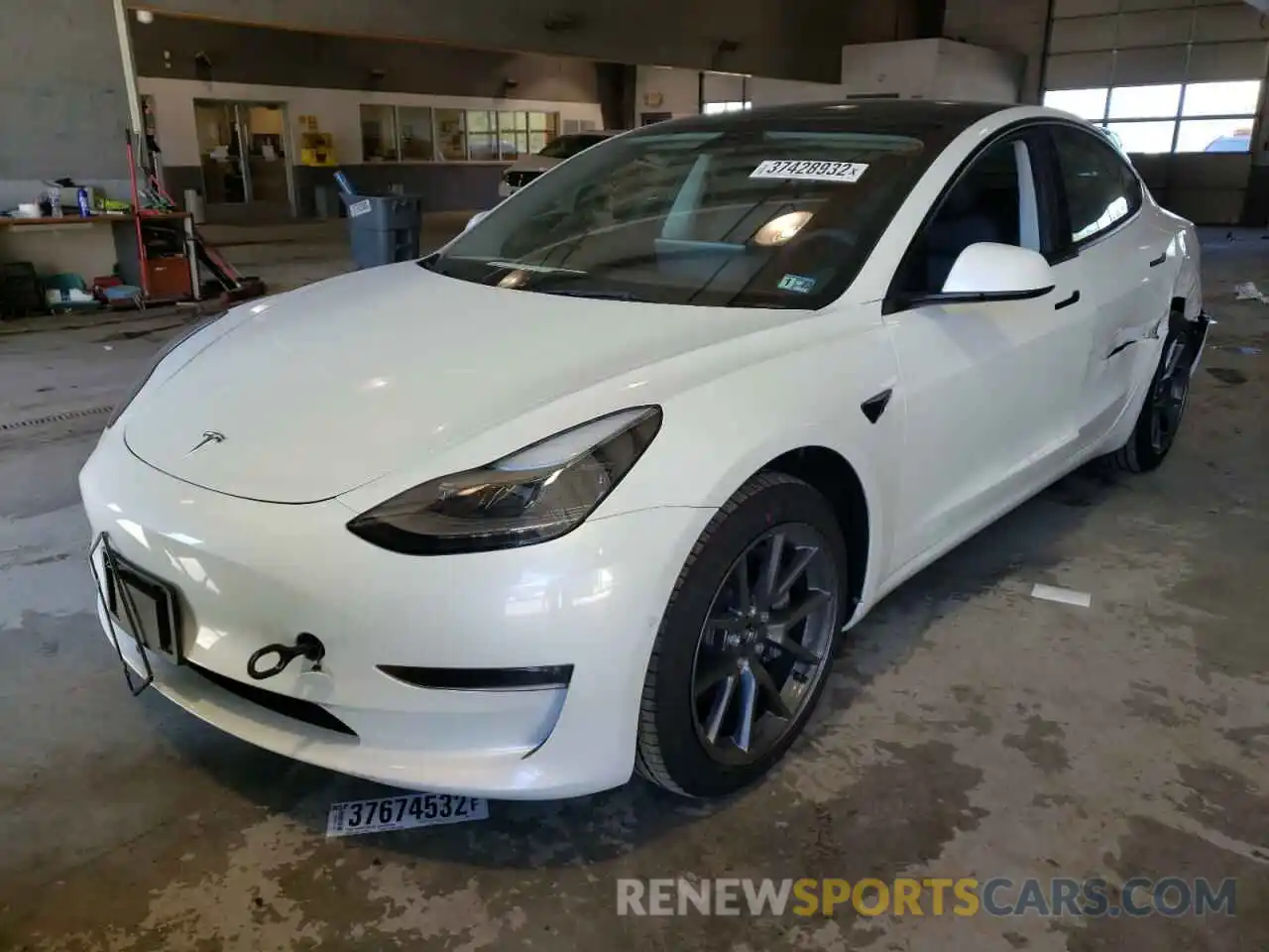 2 Photograph of a damaged car 5YJ3E1EB4NF108306 TESLA MODEL 3 2022