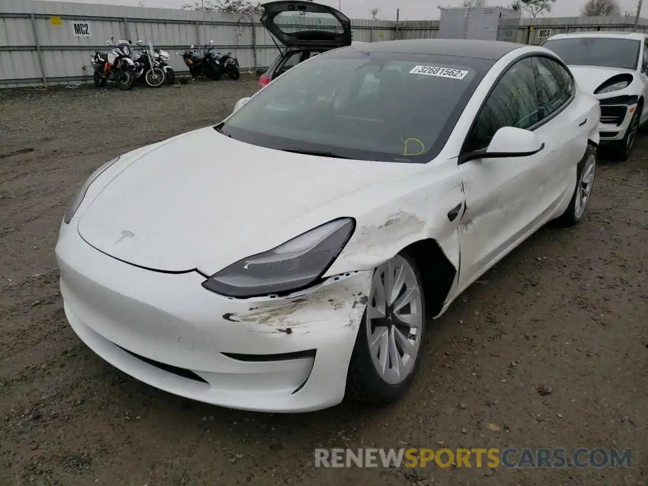 2 Photograph of a damaged car 5YJ3E1EB4NF127664 TESLA MODEL 3 2022