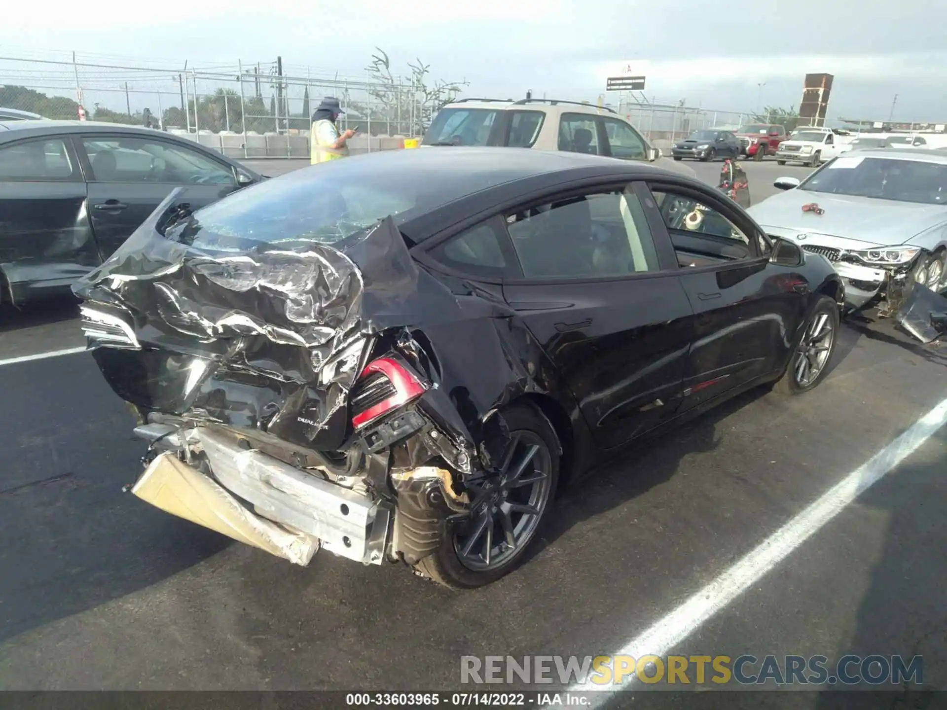 4 Photograph of a damaged car 5YJ3E1EB4NF127860 TESLA MODEL 3 2022