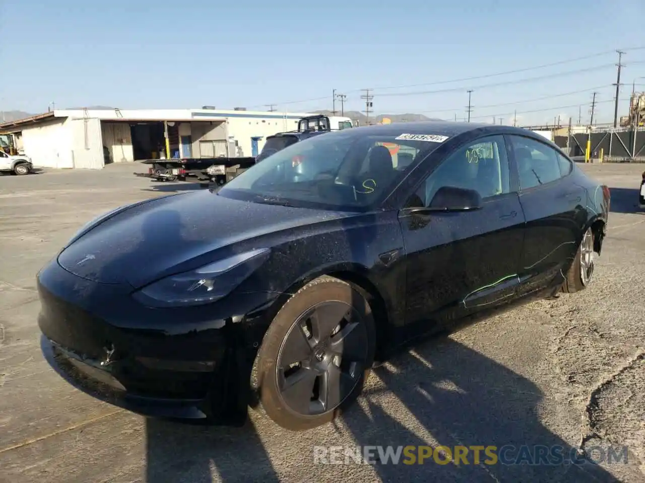 2 Photograph of a damaged car 5YJ3E1EB4NF136848 TESLA MODEL 3 2022