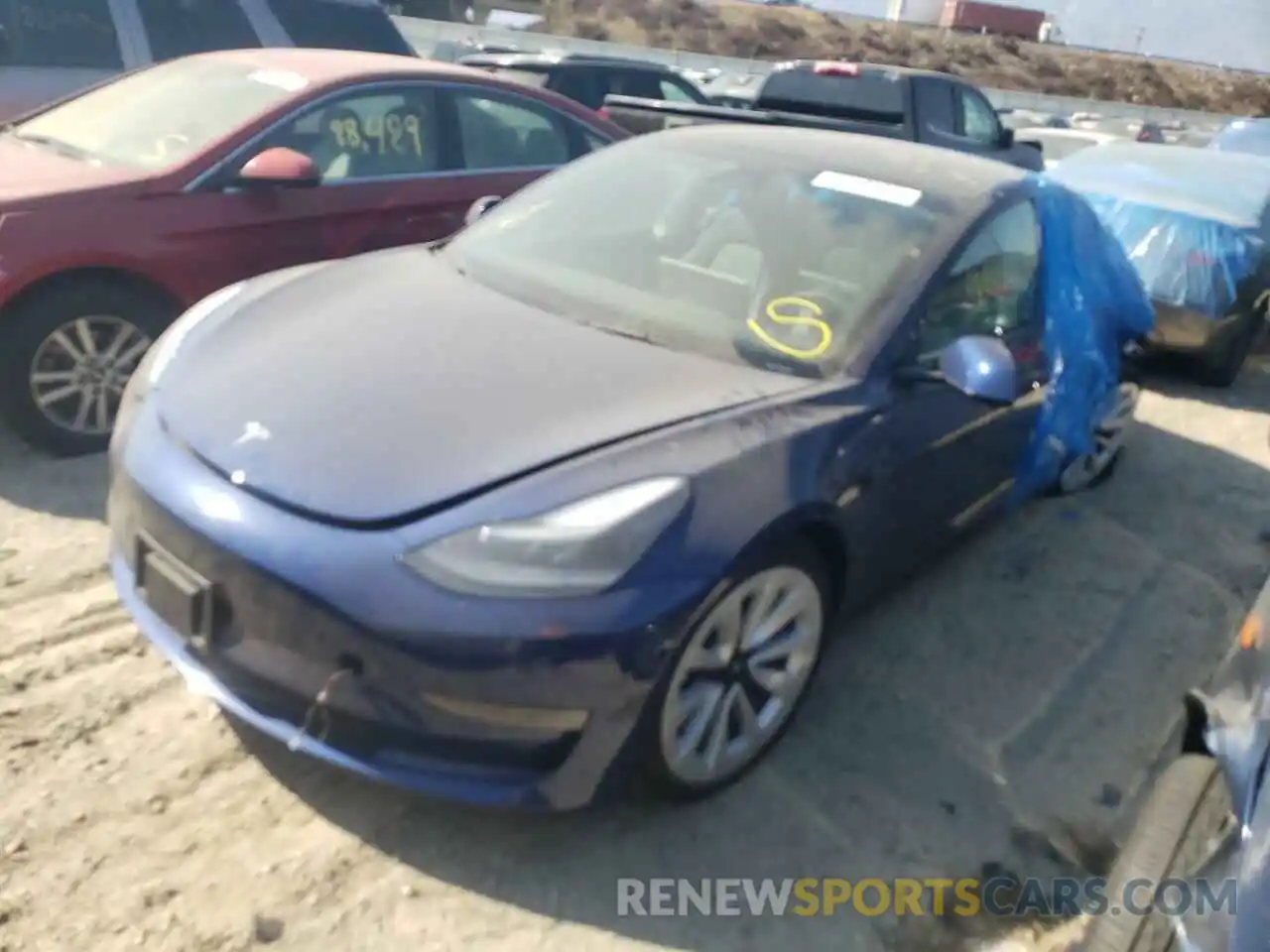 2 Photograph of a damaged car 5YJ3E1EB4NF144660 TESLA MODEL 3 2022