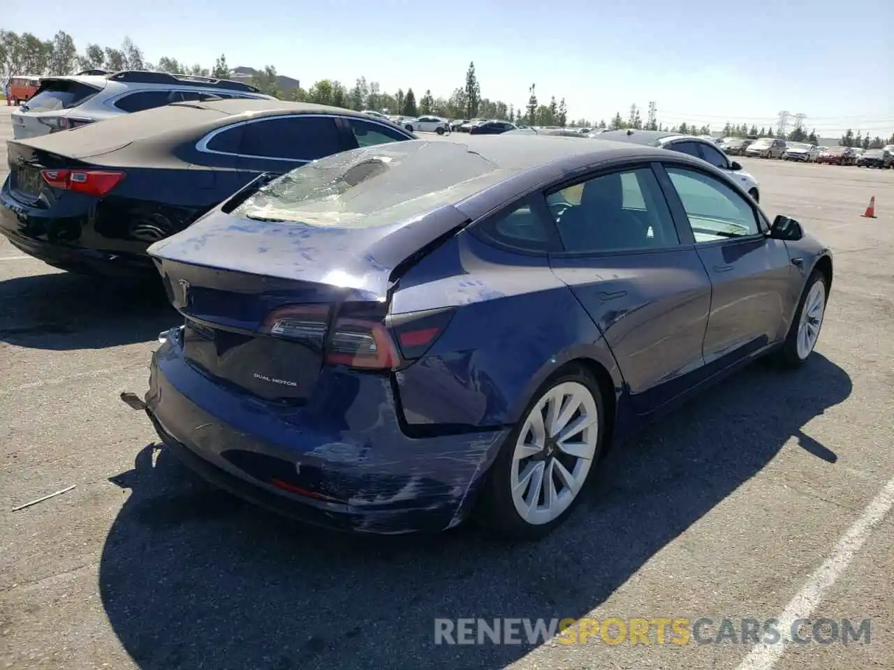 4 Photograph of a damaged car 5YJ3E1EB4NF144660 TESLA MODEL 3 2022