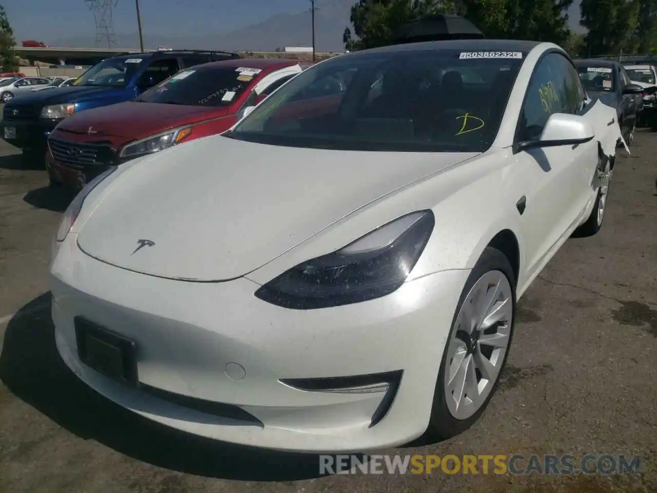 2 Photograph of a damaged car 5YJ3E1EB4NF145386 TESLA MODEL 3 2022