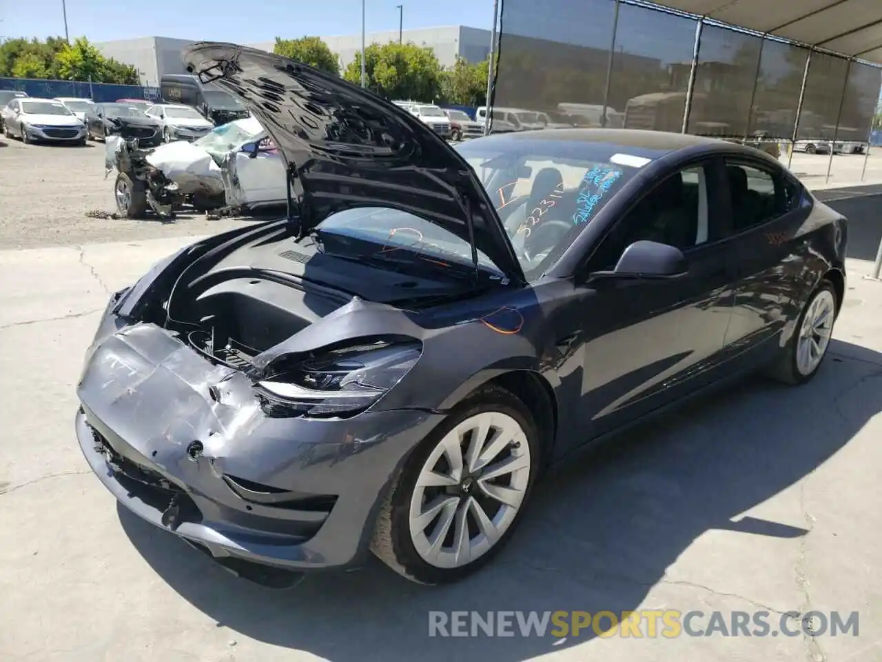 2 Photograph of a damaged car 5YJ3E1EB4NF145758 TESLA MODEL 3 2022