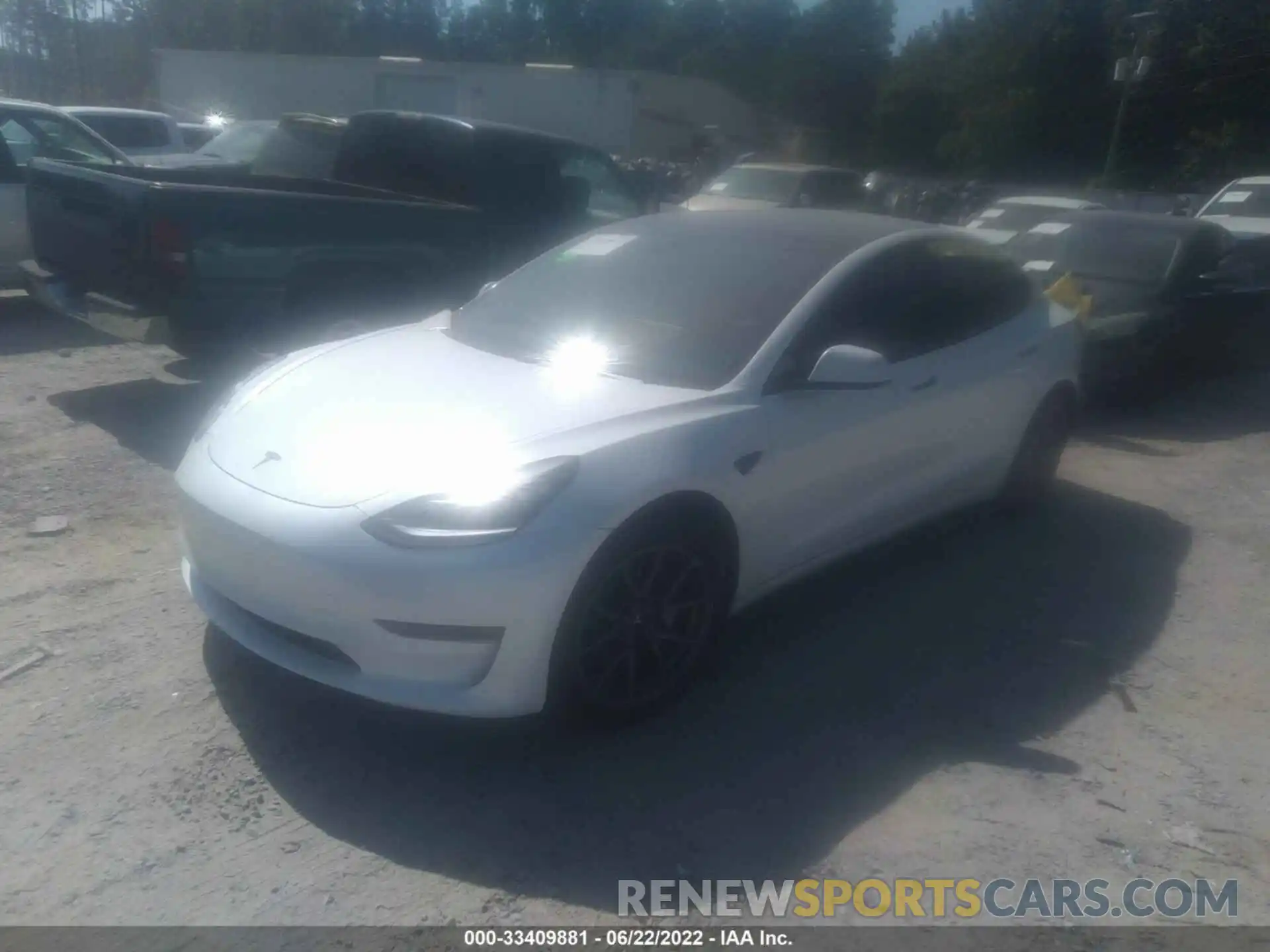 2 Photograph of a damaged car 5YJ3E1EB4NF162186 TESLA MODEL 3 2022