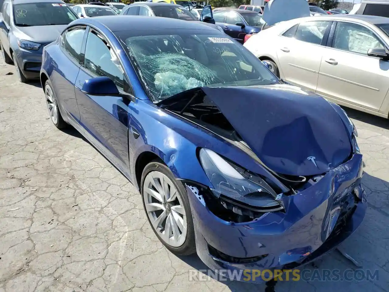 1 Photograph of a damaged car 5YJ3E1EB4NF185631 TESLA MODEL 3 2022