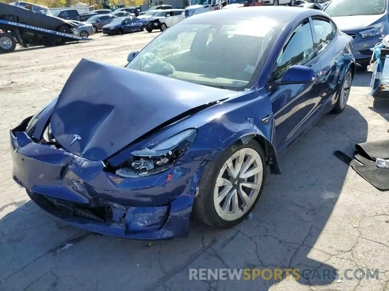 2 Photograph of a damaged car 5YJ3E1EB4NF185631 TESLA MODEL 3 2022