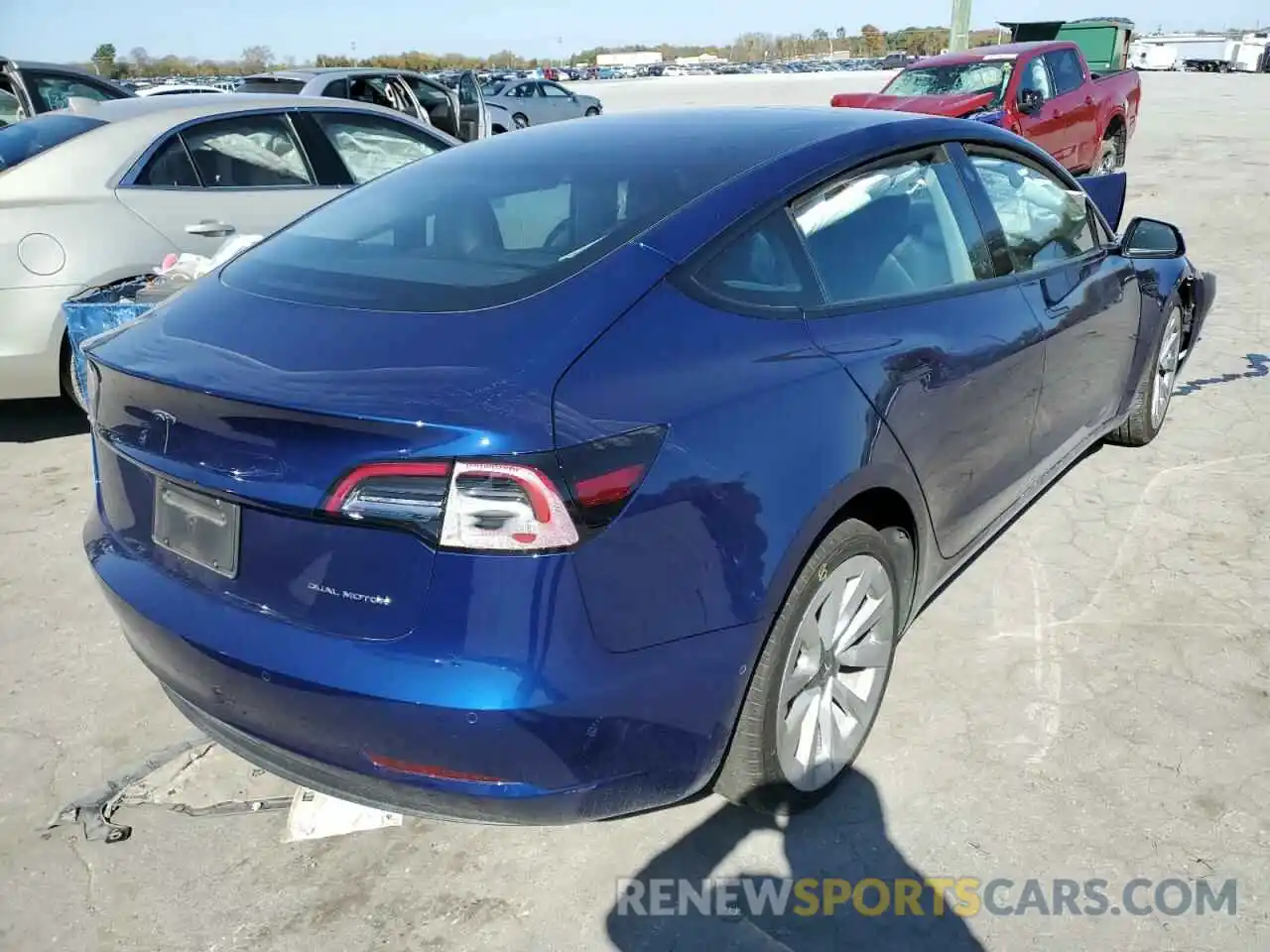 4 Photograph of a damaged car 5YJ3E1EB4NF185631 TESLA MODEL 3 2022