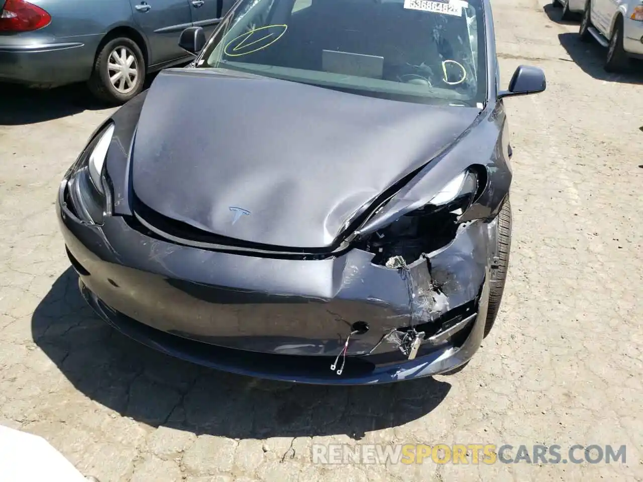 9 Photograph of a damaged car 5YJ3E1EB4NF189727 TESLA MODEL 3 2022