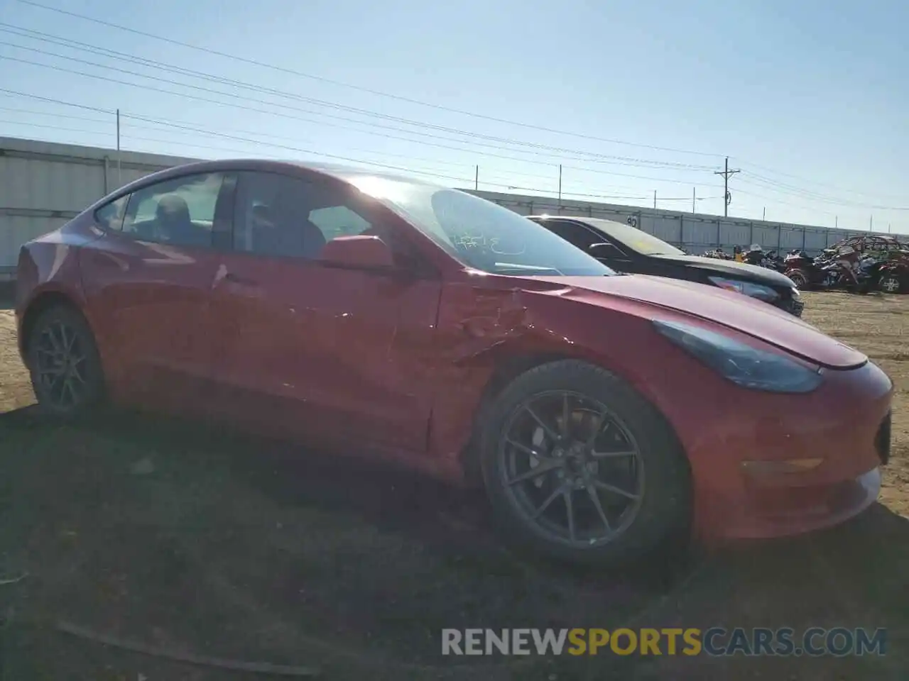 4 Photograph of a damaged car 5YJ3E1EB4NF190988 TESLA MODEL 3 2022