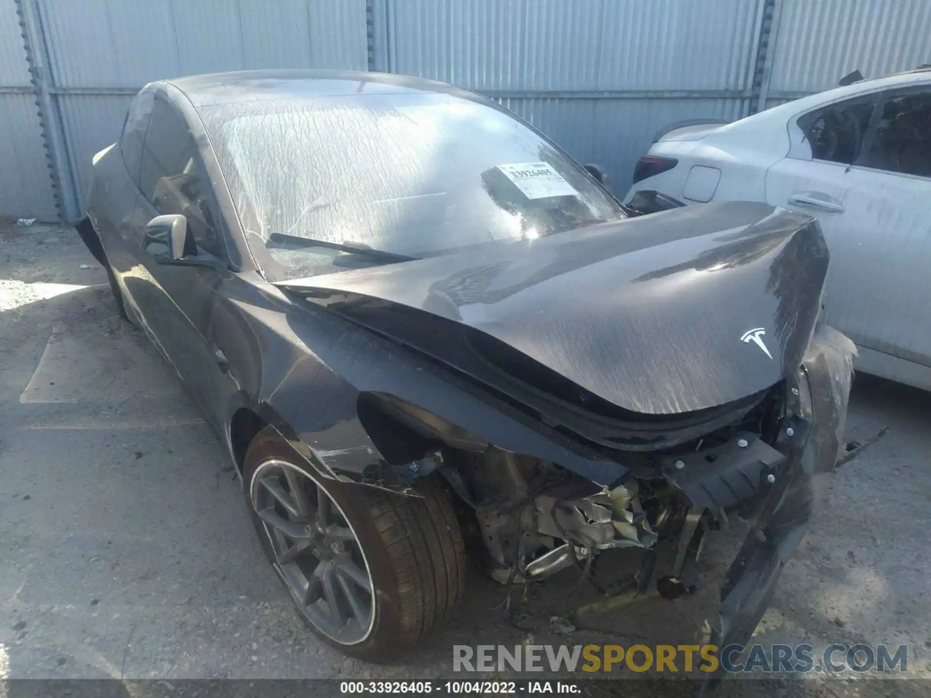 1 Photograph of a damaged car 5YJ3E1EB4NF212214 TESLA MODEL 3 2022