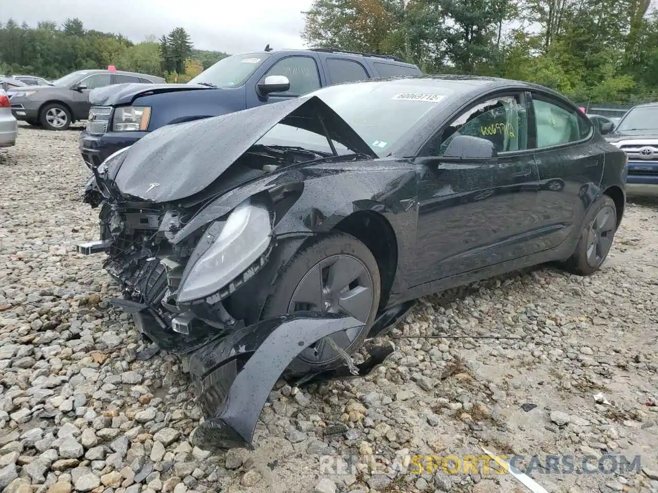 2 Photograph of a damaged car 5YJ3E1EB4NF264037 TESLA MODEL 3 2022