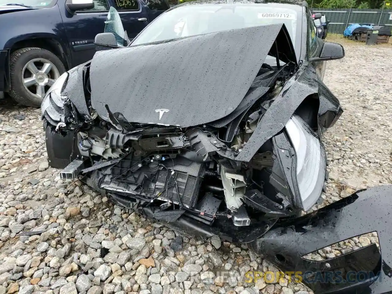 9 Photograph of a damaged car 5YJ3E1EB4NF264037 TESLA MODEL 3 2022